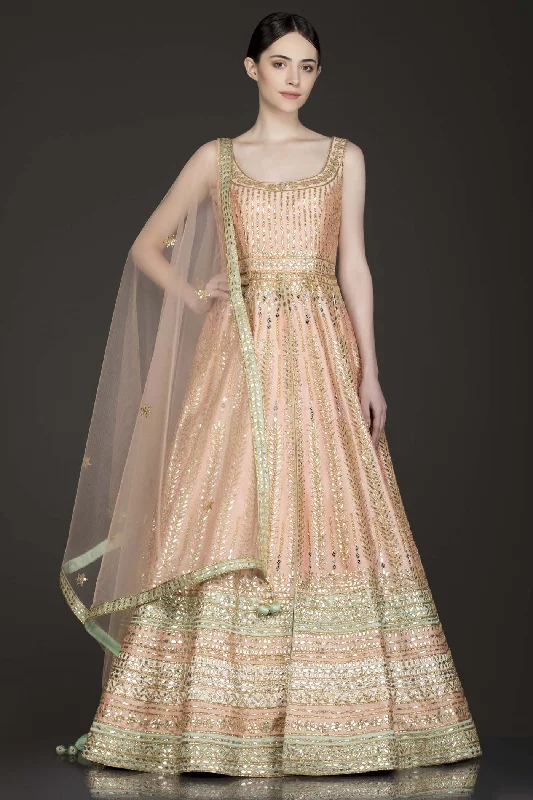 Peach Colour Silk Anarkali/Gown With Front Slit And Attached Skirt With Net Dupatta